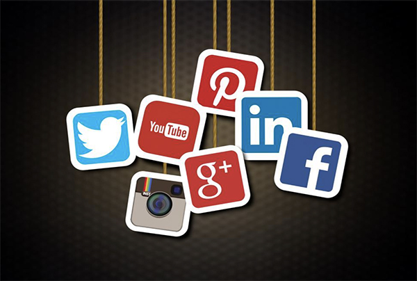 Social media icons hanging on strings