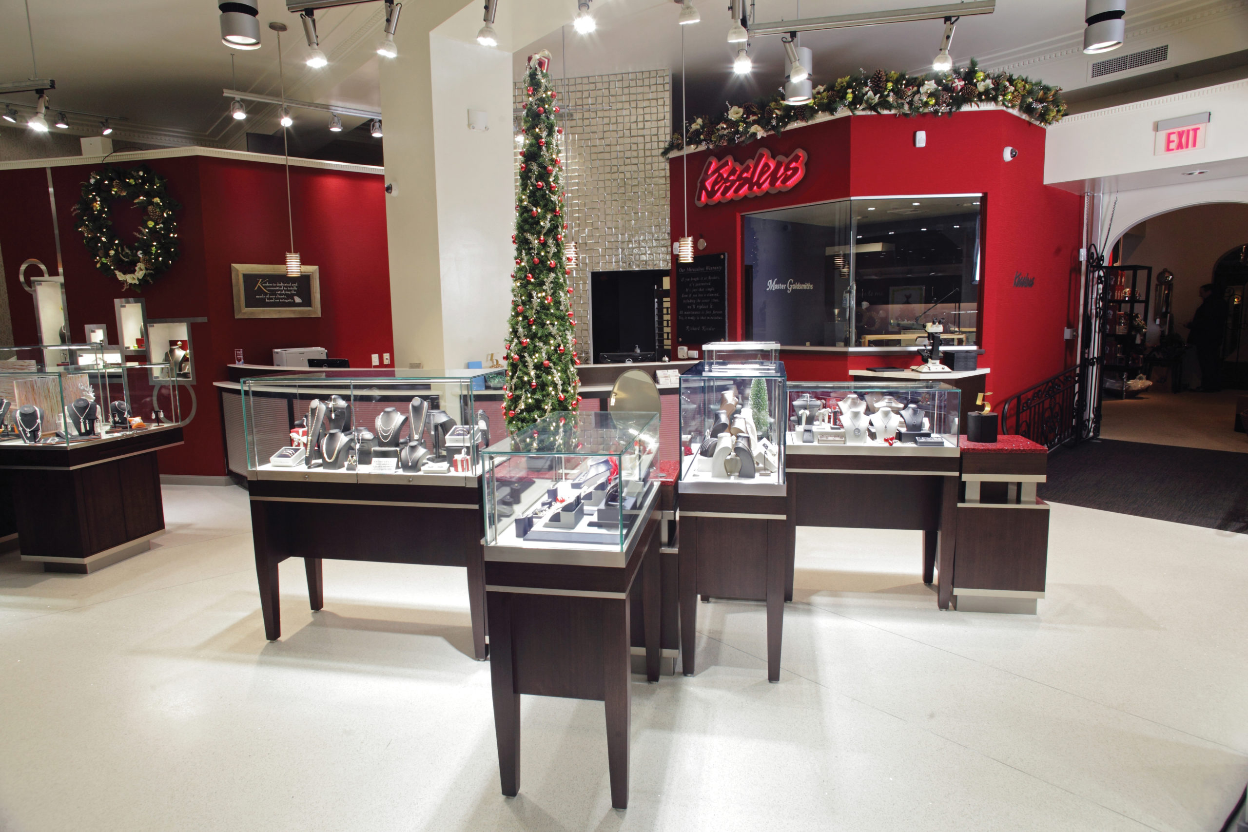 Glass displays cases decorated for the holidays in Kesslers Diamonds