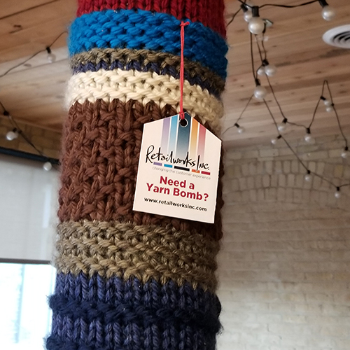 knit or crocheted yarn bomb