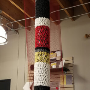 knit or crocheted yarn bomb