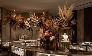 Interior jewelry store with floral displays throughout