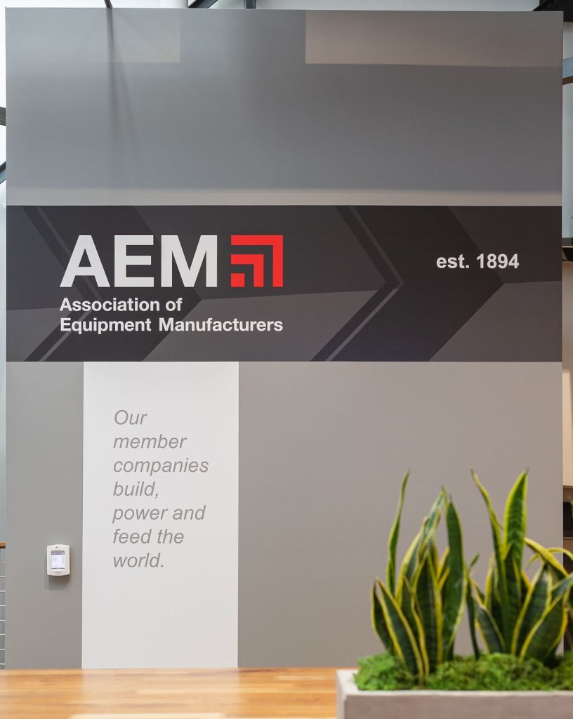 AEM headquarters branded lobby wall.